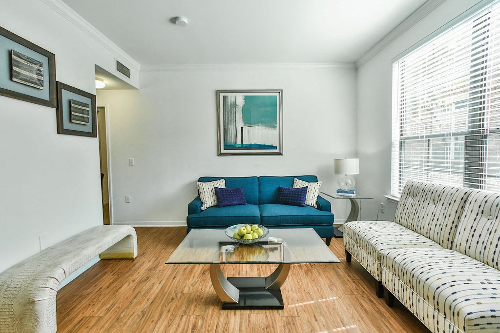 a living room with a couch and a coffee table