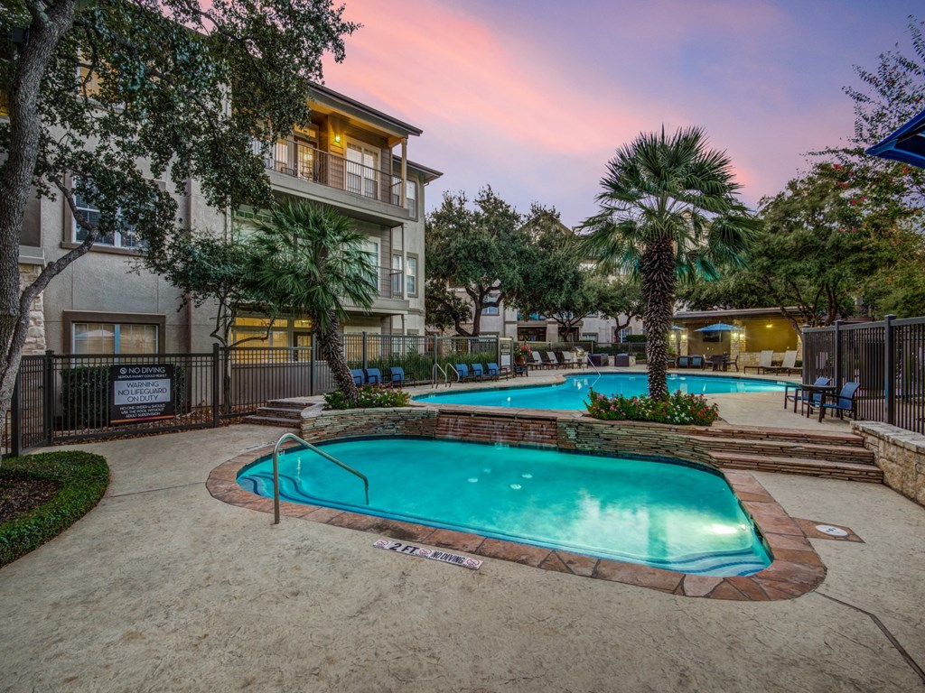 the preserve at ballantyne commons apartments swimming pool and spa at dusk
