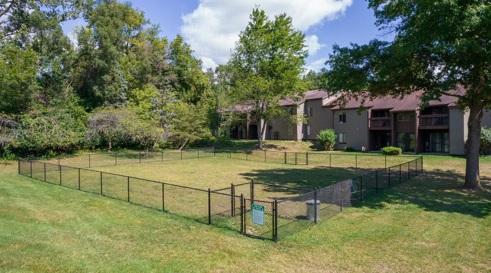 Fenced in dog park on site