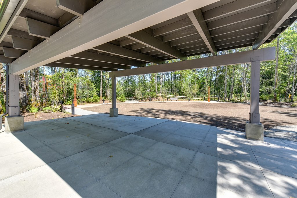 Outside Rest Area with Concrete Floor and Structure for Shade, Soil and Trees