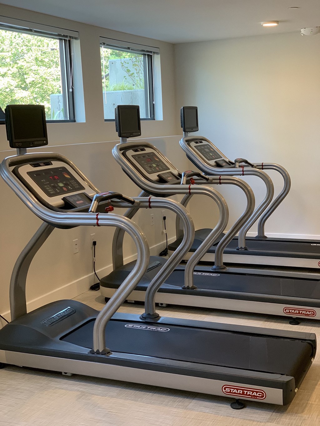 Fitness Center with Treadmills and Open Window