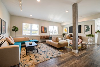 Living Room Living Room with Wood Inspired Floor, Tan Sofas, Open Windows, Pillar, Flat Screen Television Mounted on Wall - Photo Gallery 5