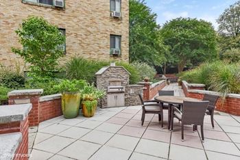Courtyard With Summer Kitchens at The Saratoga Apartments, Washington, Washington
