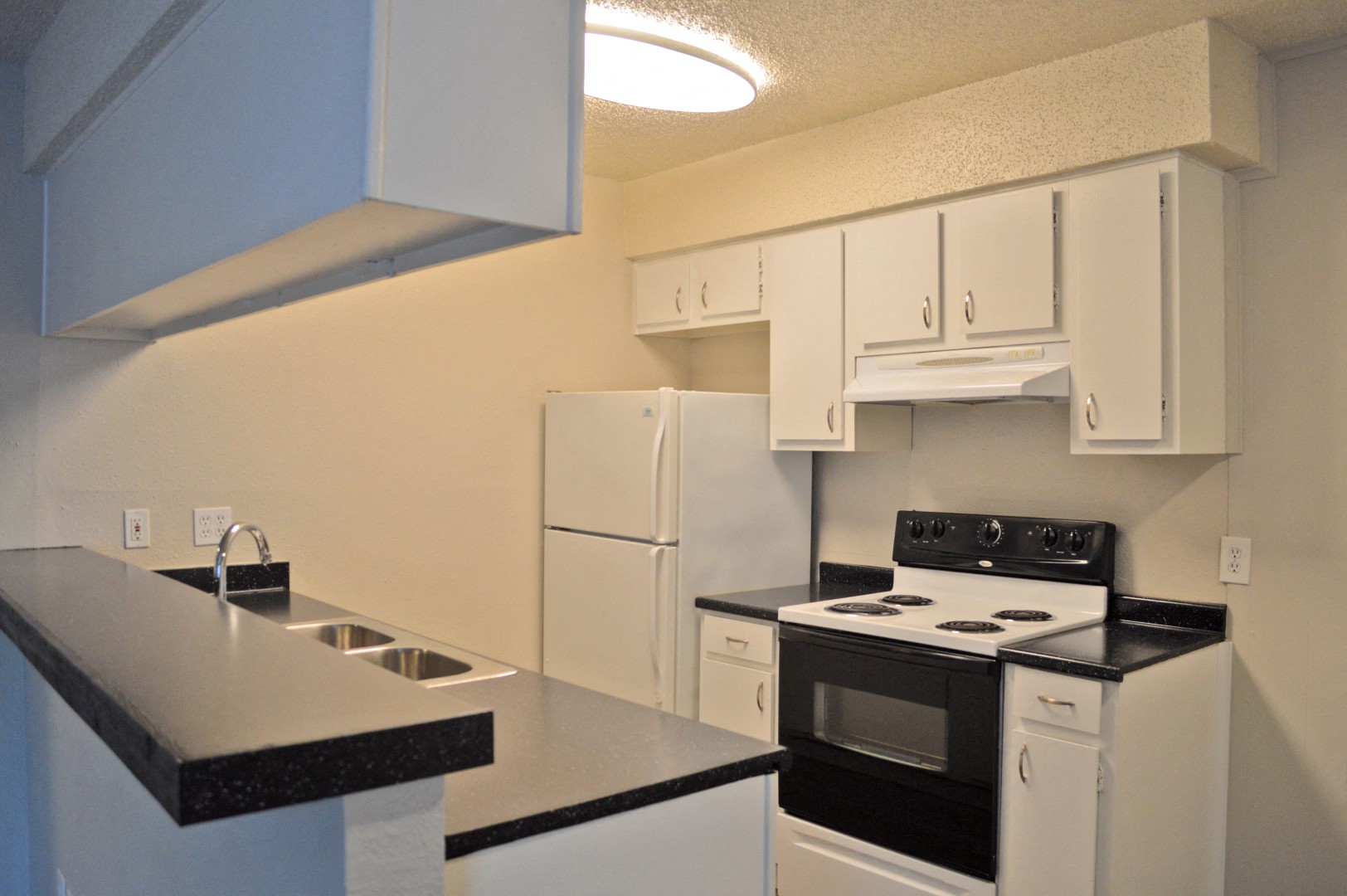 kitchen with white cabinets
