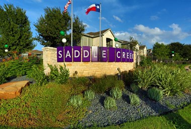 Welcoming Property Sign at Saddle Creek Apartments, Texas, 78748