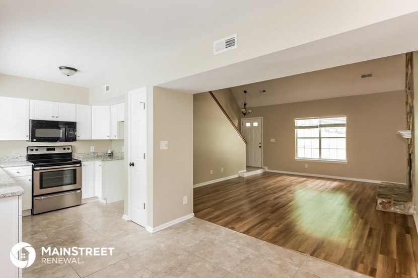 the kitchen and living room are spacious and open to the rest of the house