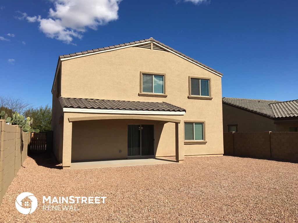 a house with a driveway and a garage door