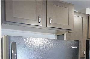 kitchen Modern kitchen with designer cabinetry, black appliances, solid counter tops. - Photo Gallery 3