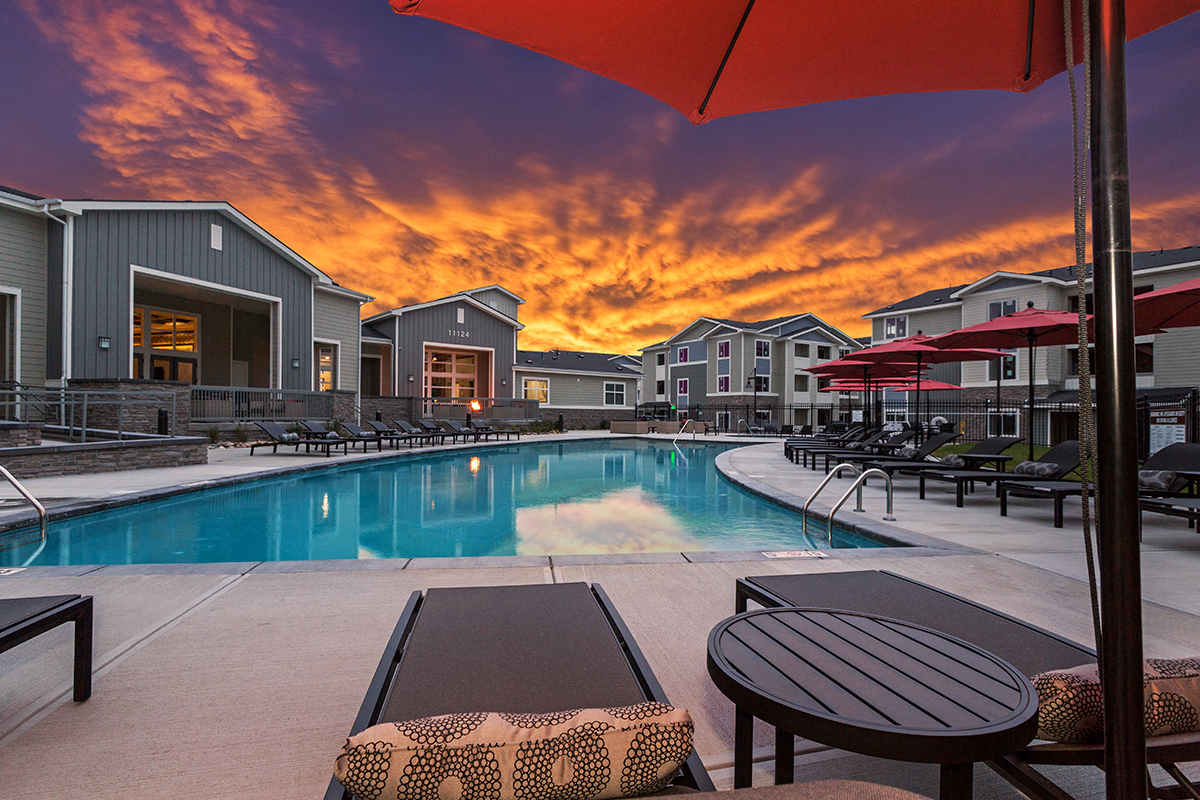 Beautiful Sunset at Colorado Springs Apartments with Pool and Deck
