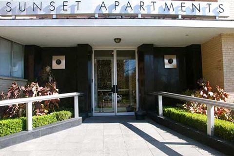 the sunset apartments entrance of the building
