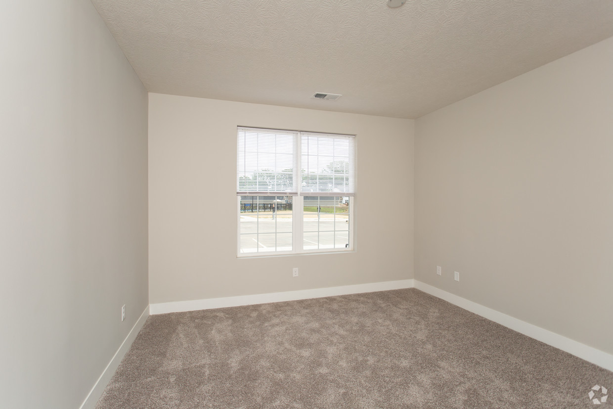 The Ervin Master Suite Bedroom  at The Flats on Houk, Delaware, Ohio
