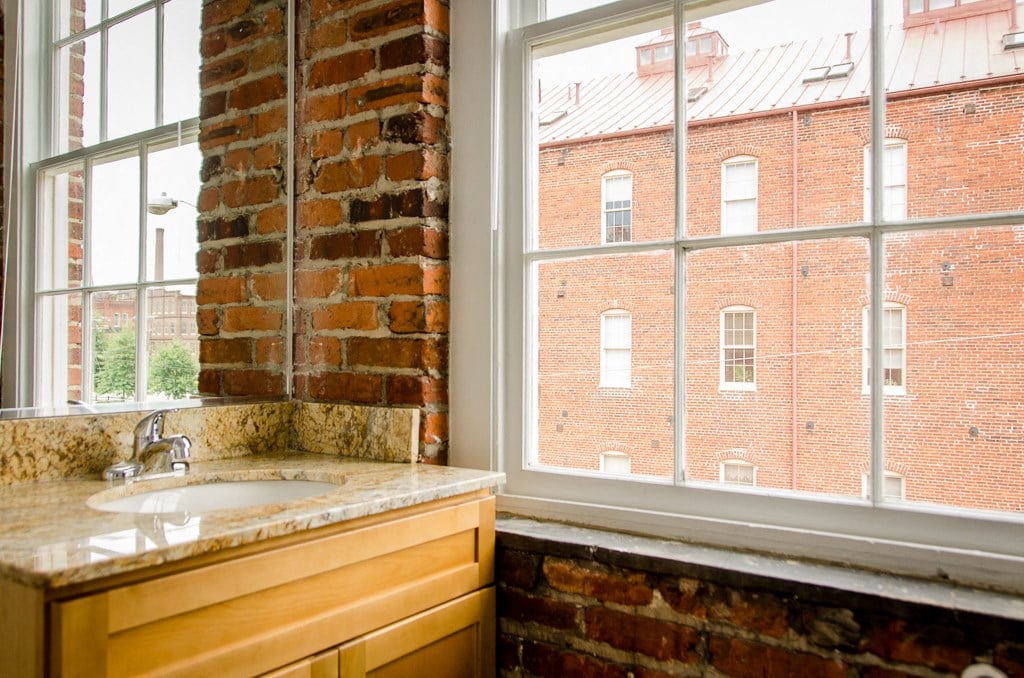 a kitchen with a sink and a window