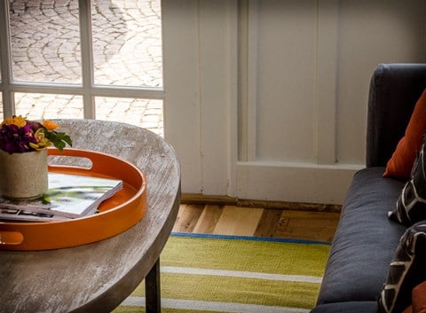 a living room with a couch and a coffee table