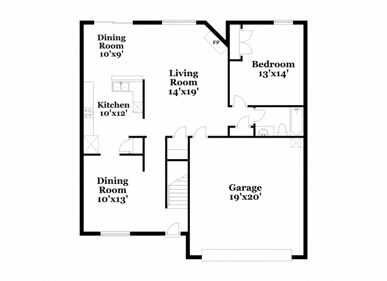 a floor plan of a house with a garage and a kitchen and a living room