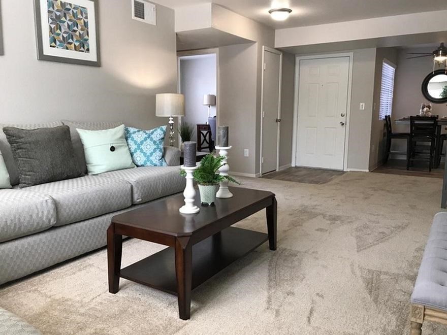 a living room with a couch and a coffee table
