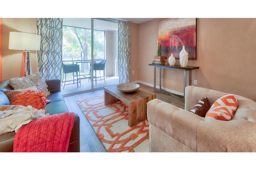 a living room with a couch and a table