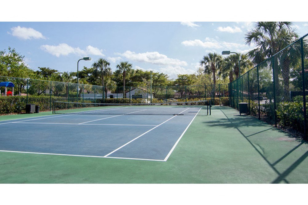 a tennis court with a person standing on it