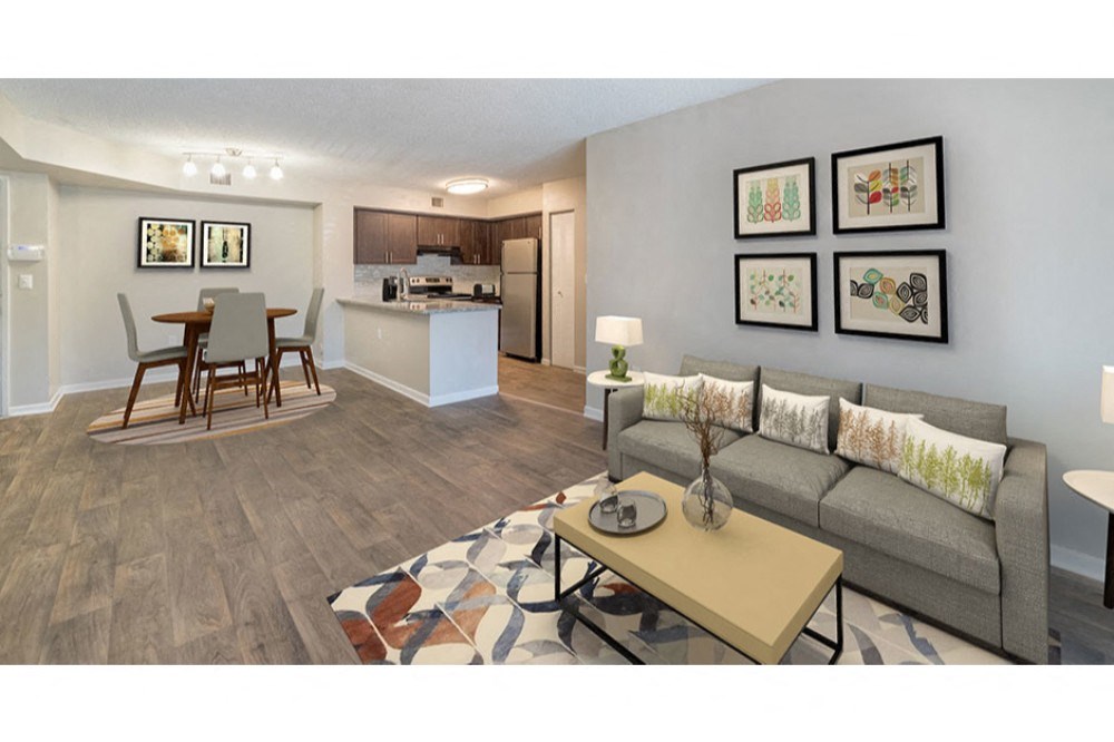 a living room with a couch and a table