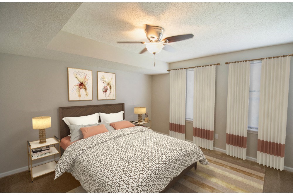 a bedroom with a bed and a ceiling fan