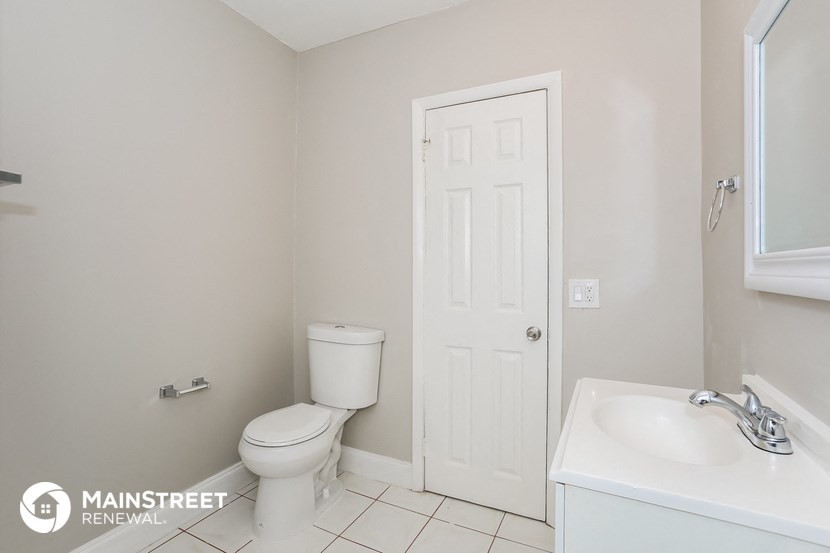 a small bathroom with a toilet and a sink