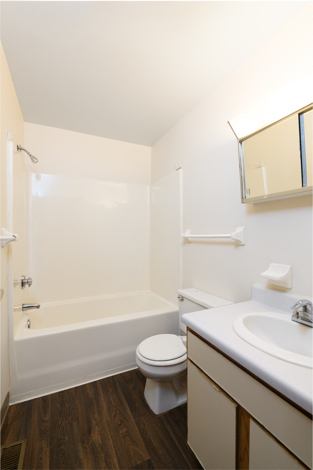 a small bathroom with a toilet sink and shower