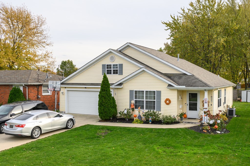 a house with a car parked in front of it