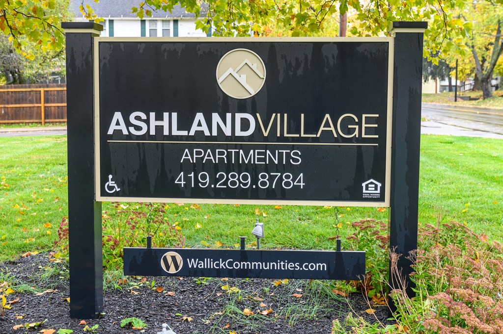 a sign for the apartments