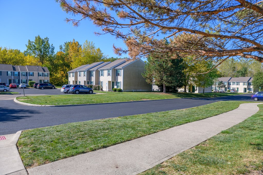 a street with houses on the side of a road