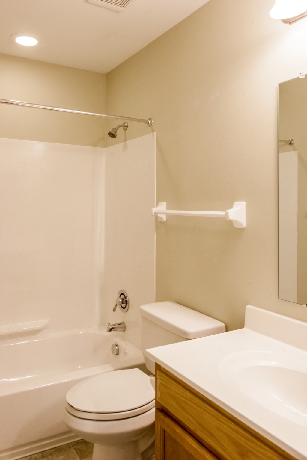 a bathroom with a sink toilet and a shower