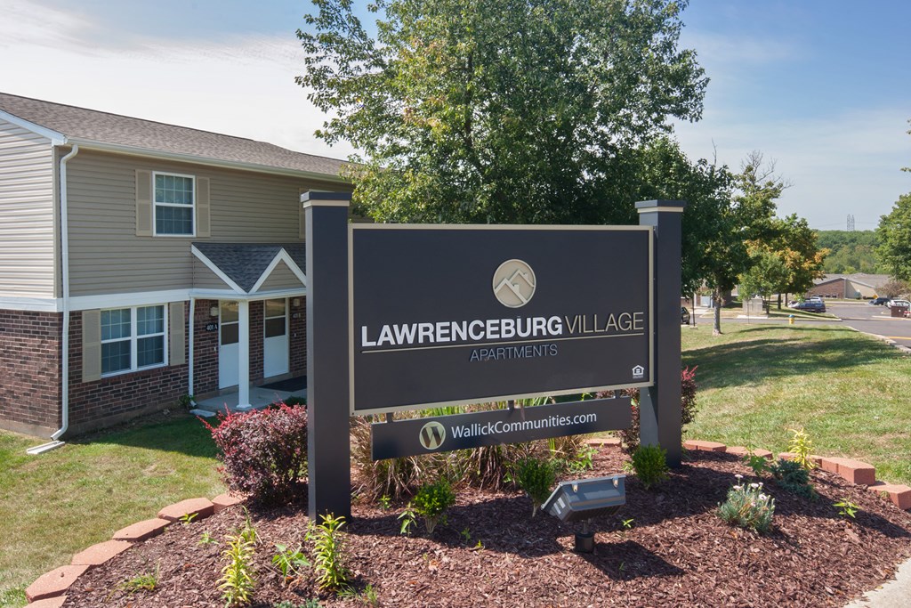 the sign village in front of a building