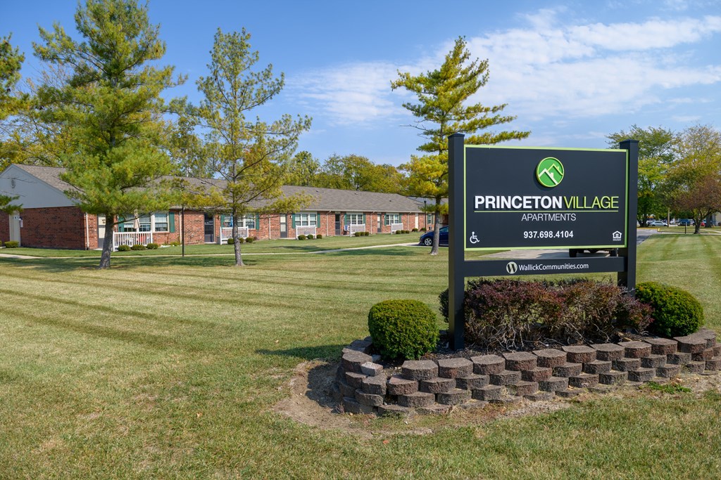 the sign in front of a brick building