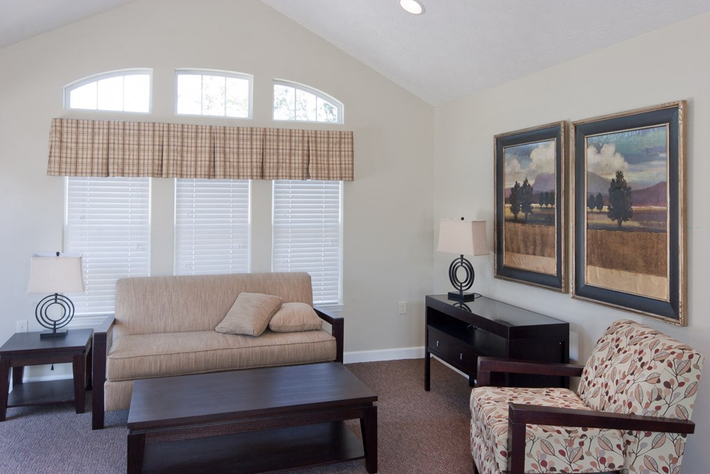 a living room with a couch and a table