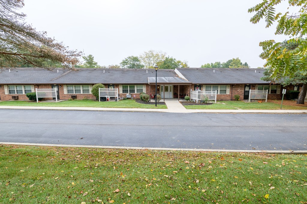 the view of a brick house from the street