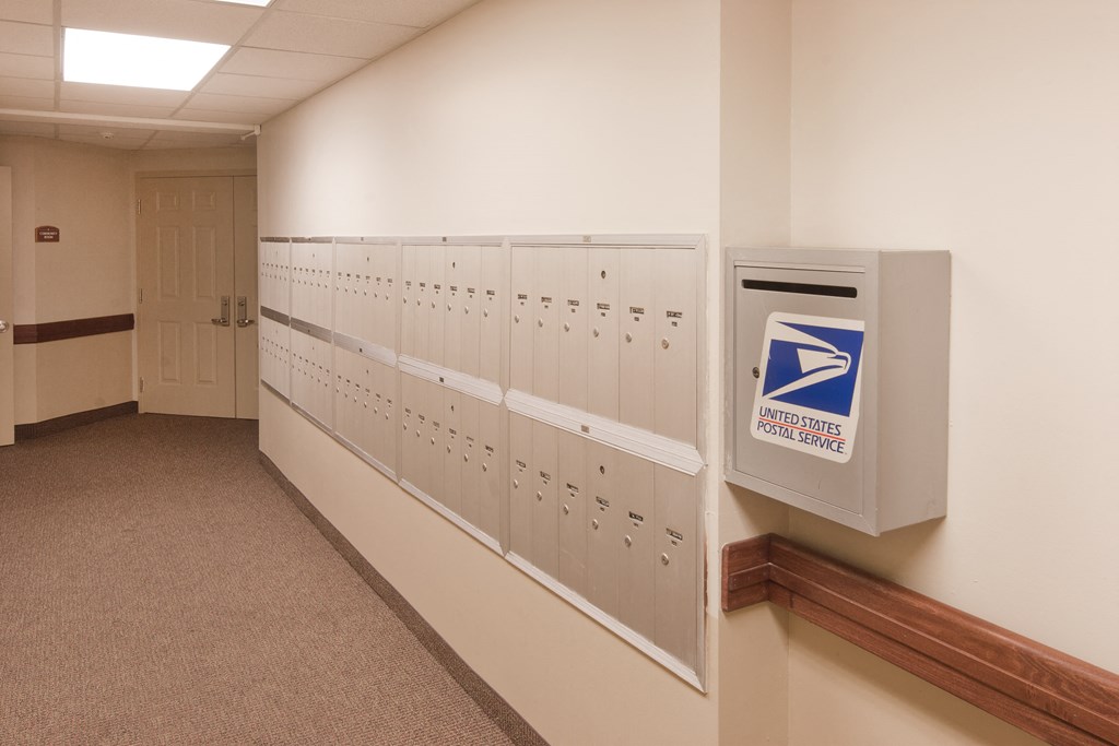 a row of lockers in a hallway of a building