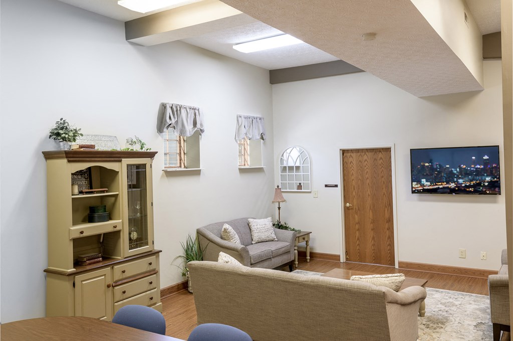 a living room with a couch and a table