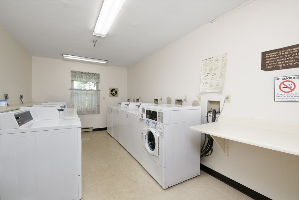 the laundry room is equipped with washes and dryers