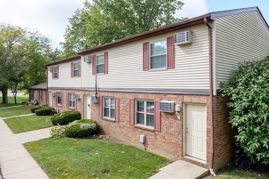 a brick and with a white door