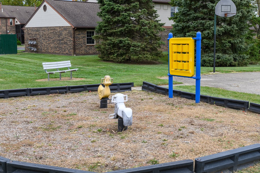 two fire hydrants in the middle of a playground