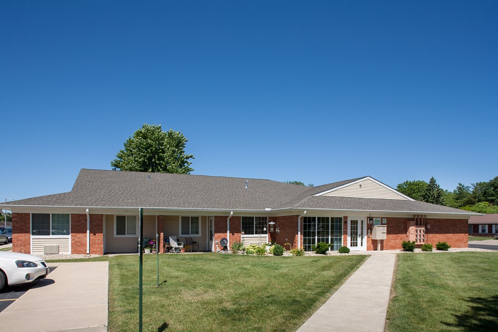a house with a lawn in front of it