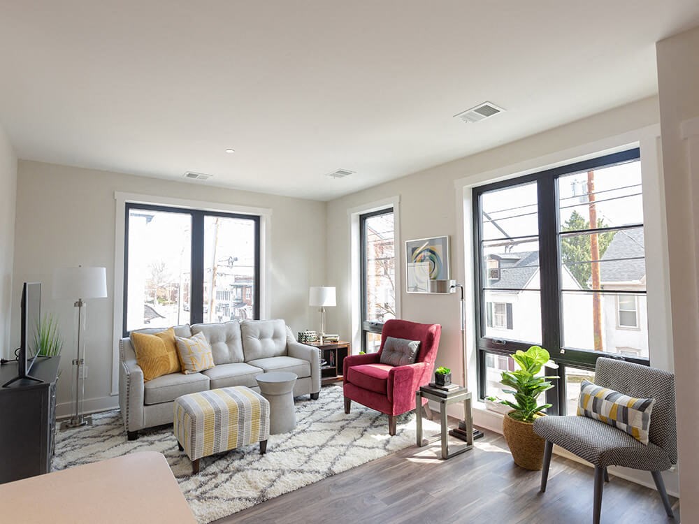 Modern Living Room With Expansive Window at Walnut Street Commons, Allentown, PA, Pennsylvania