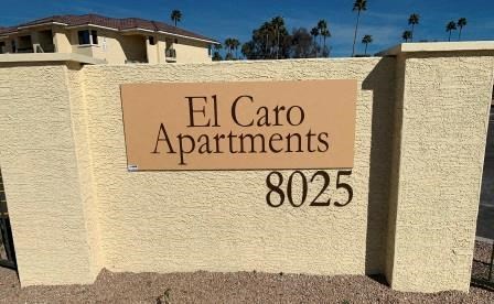 a sign is on the side of a building