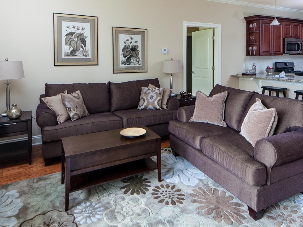 a living room with a couch and a table