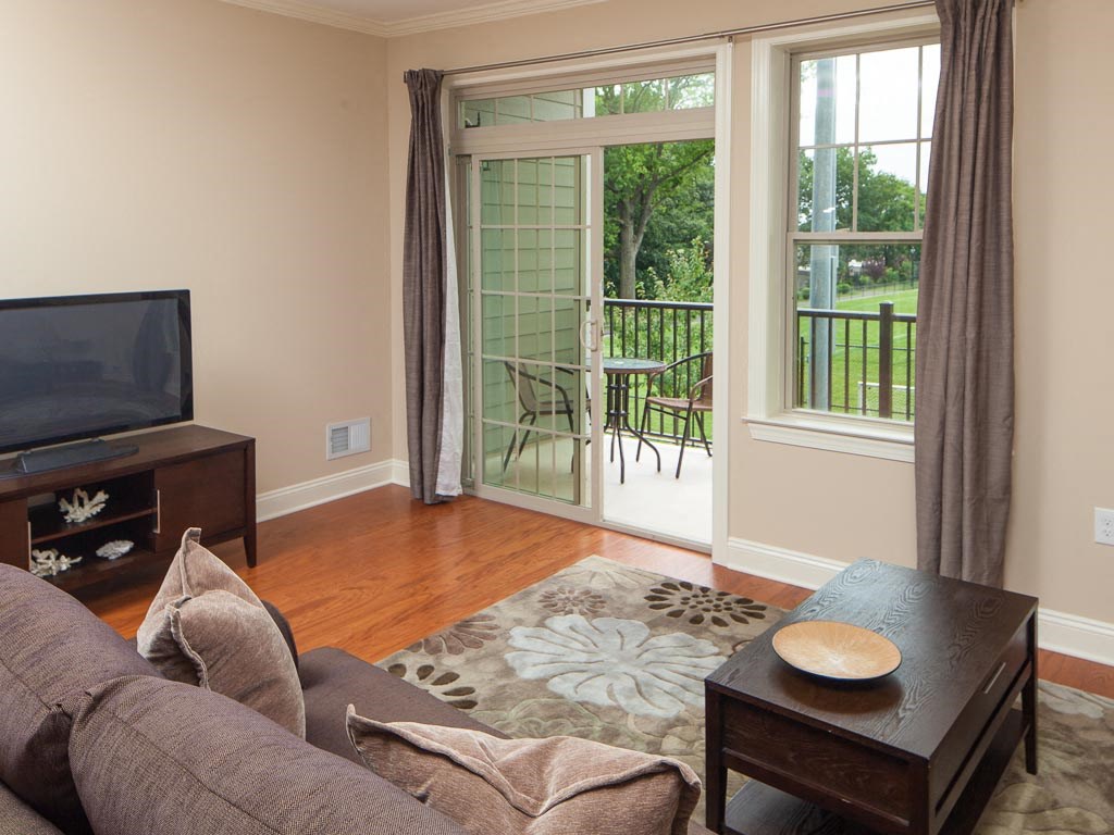 a living room with a couch and a tv