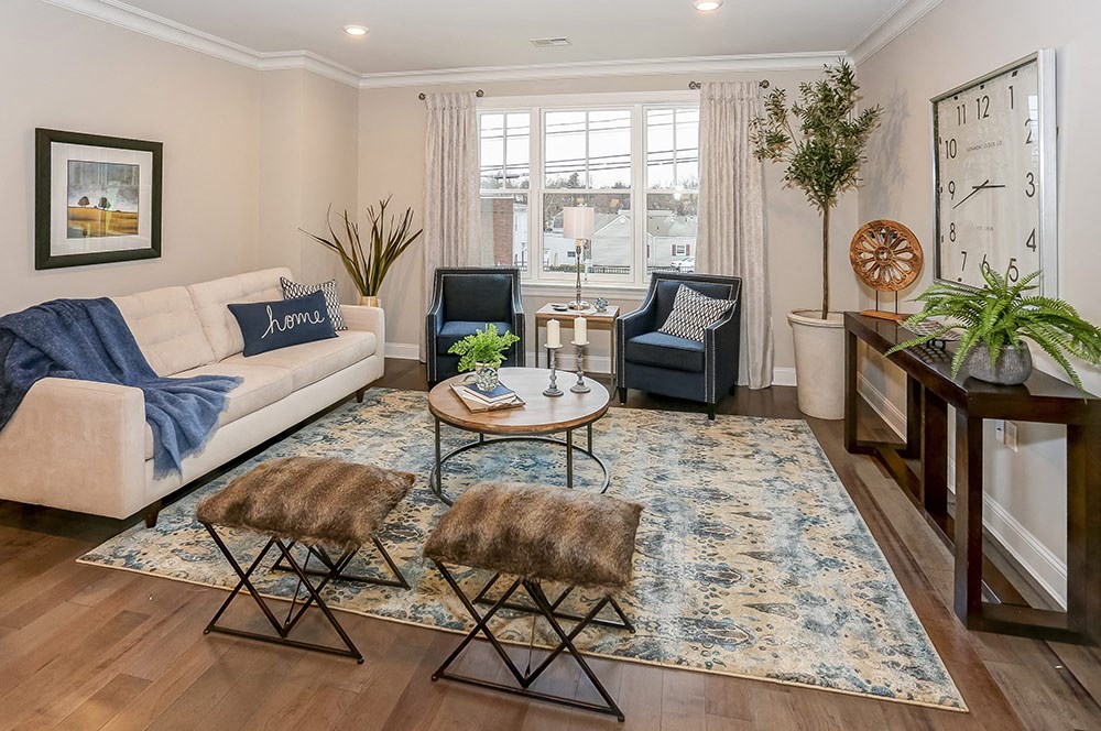 a living room with a couch and a table