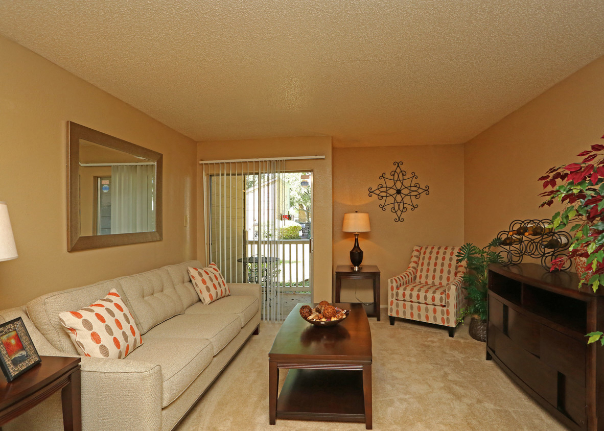 a living room with a couch and a table