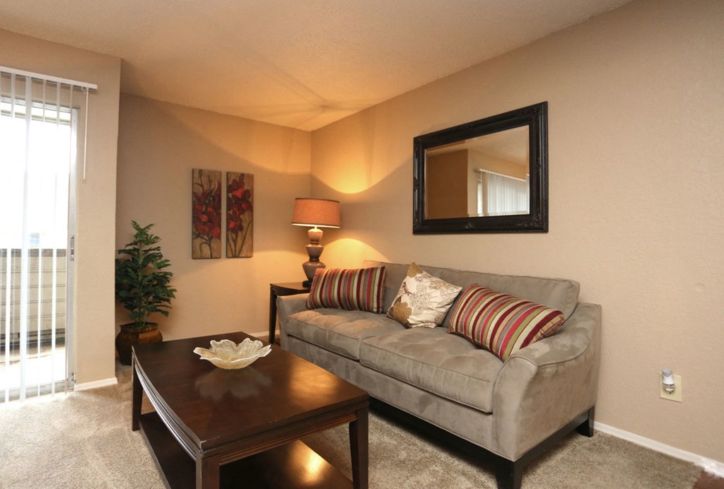 a living room with a couch and a coffee table