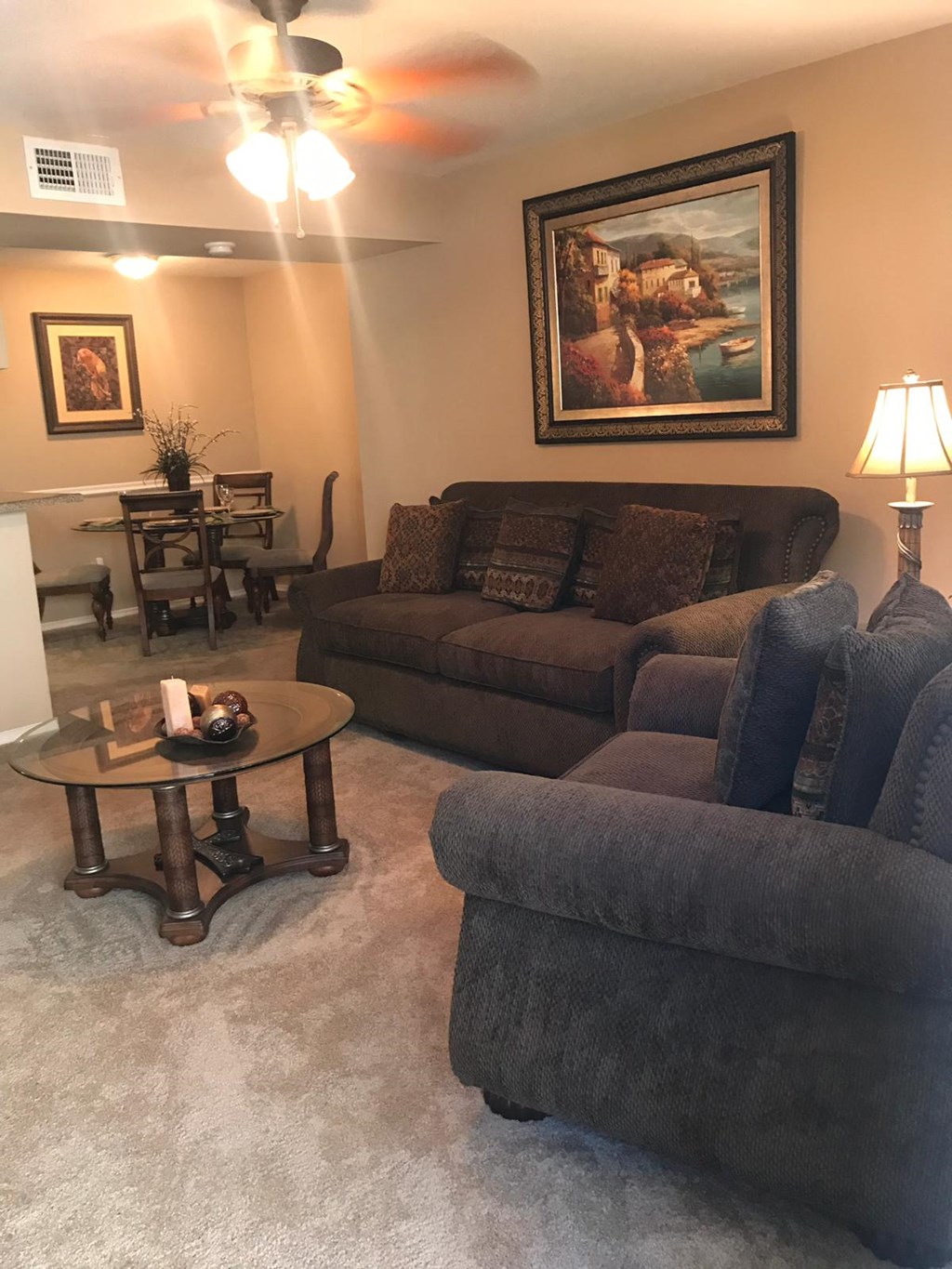 a living room with couches and a coffee table