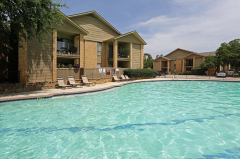 the swimming pool at the falls at rolland park apartments fl