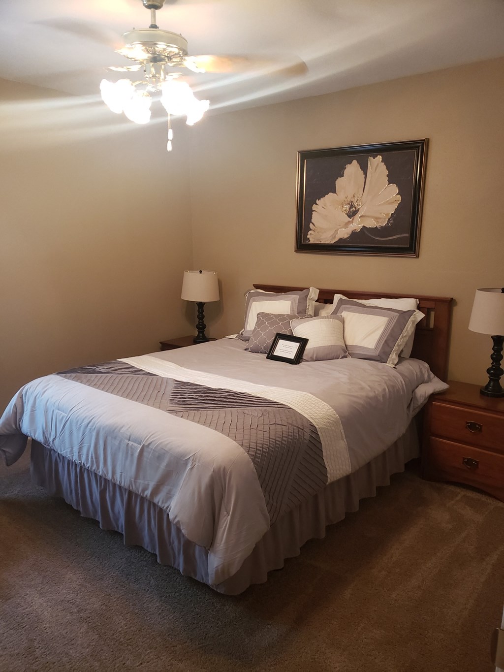 the master bedroom has a king size bed