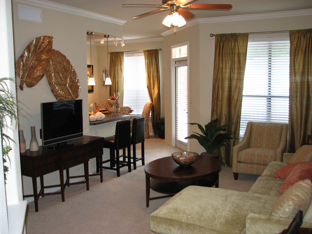 a living room with a couch and a table